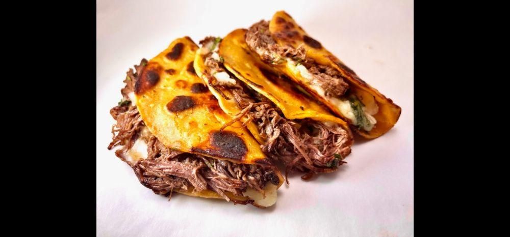 Birria Quesa Tacos dish