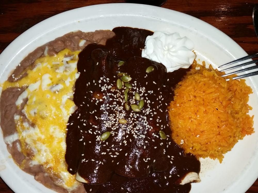 Enchilada De Mole Poblano dish